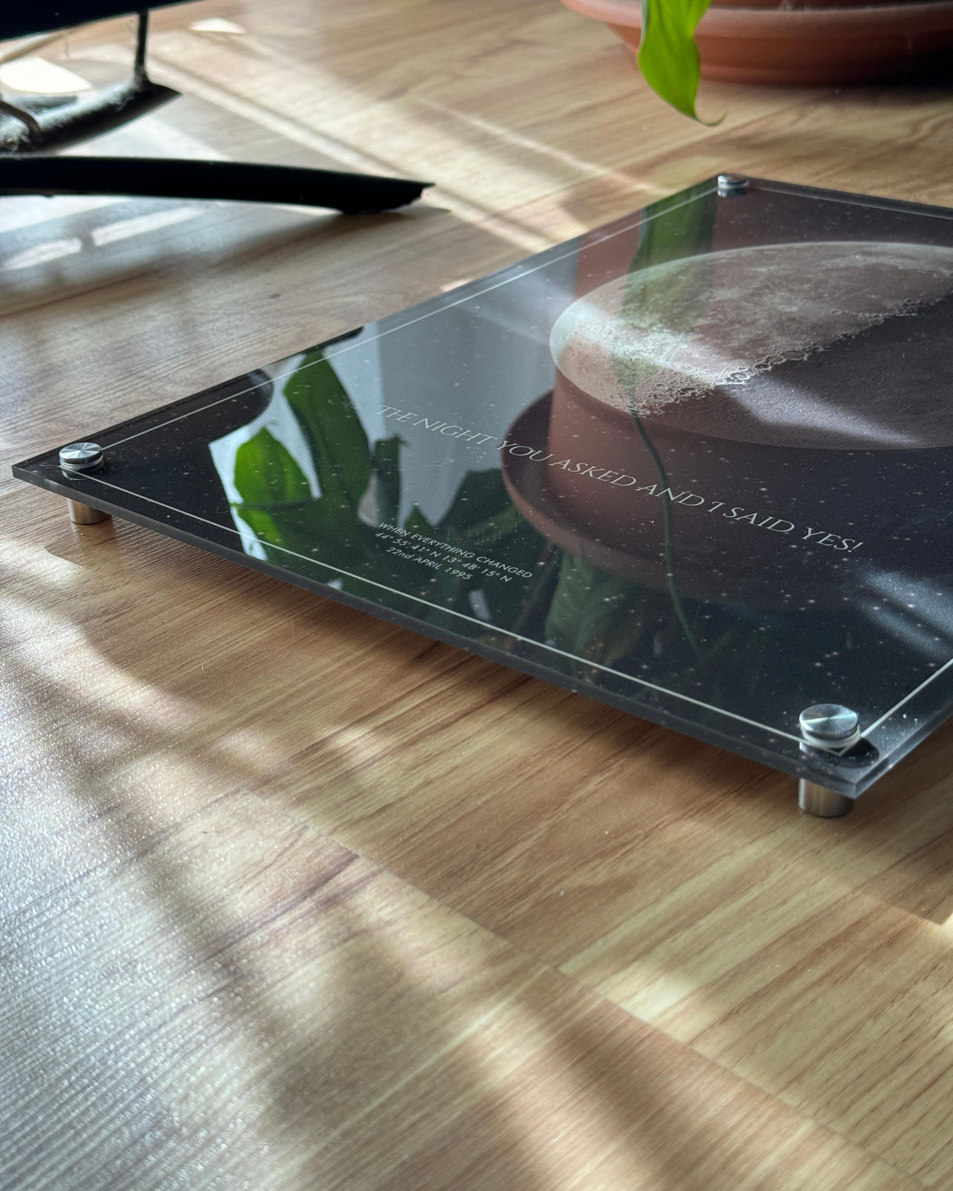 Single moon phase wall art in acrylic, portrait format, showcasing a dark neutral tone