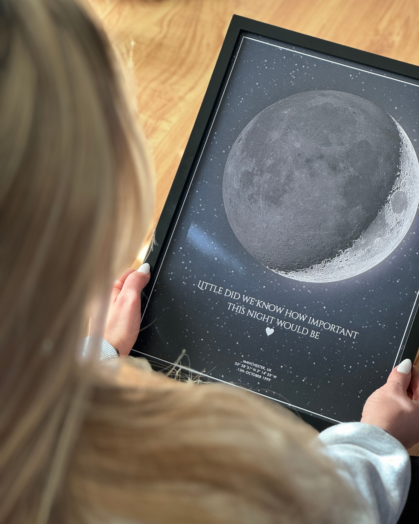 Single moon phase wall art in a black frame, showcasing a dark neutral tone for a minimalist decor style