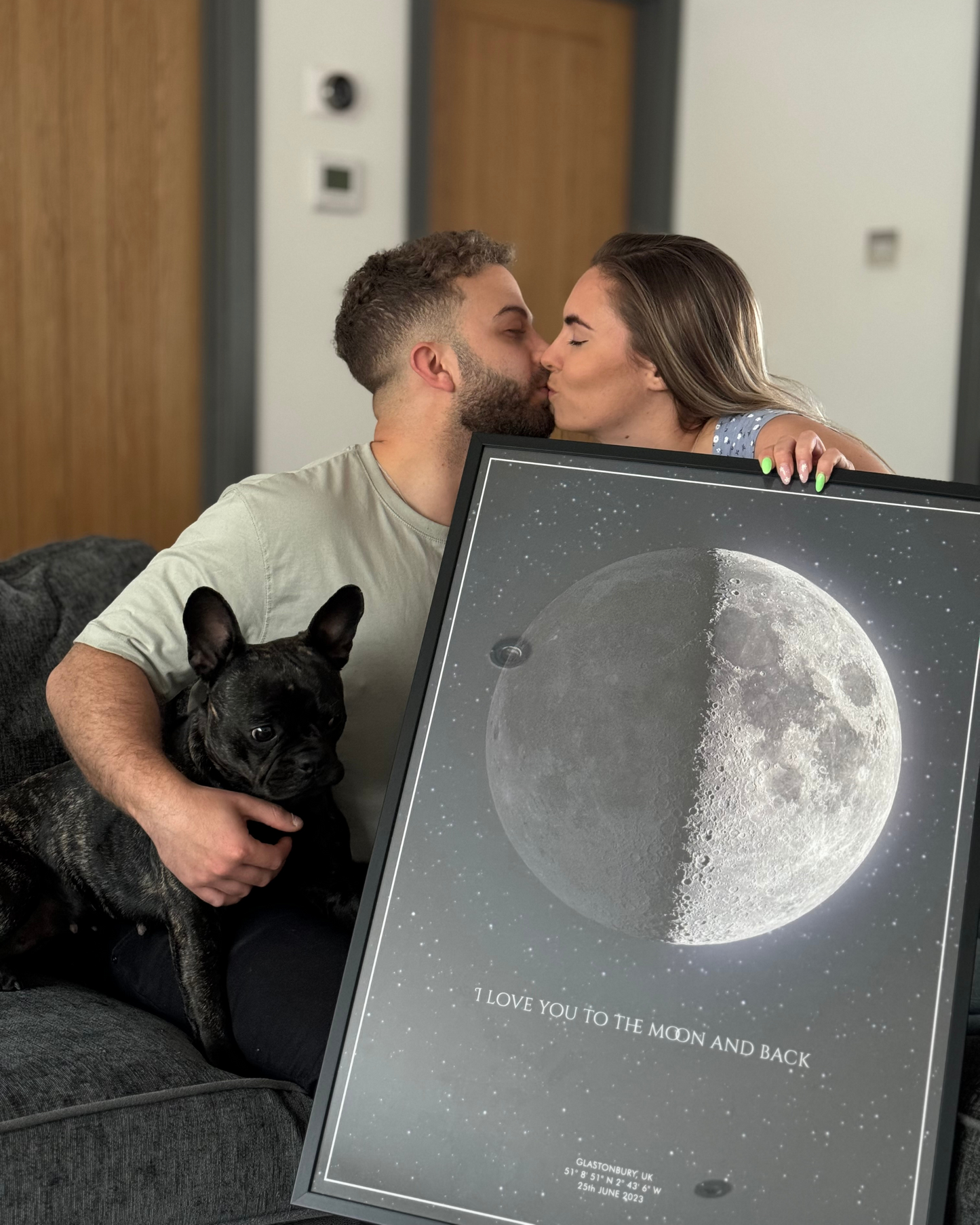 Single moon phase wall art in a black frame, showcasing a dark neutral tone, ideal for modern decor.